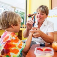 Nurse in Every Public School in Va - Student with nurse in school