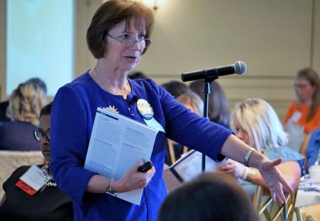 Dr. Susan Hassmiller, keynote speaker, interacts with summit participants at LAC's Culture of Health Summit