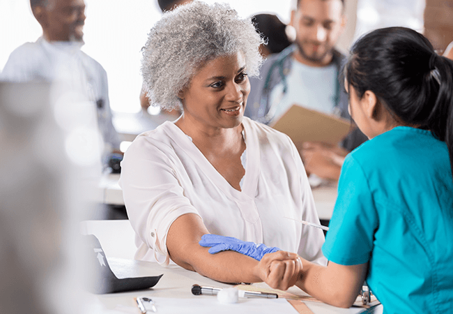 Nurses build healthier communities by working  at free flu clinics